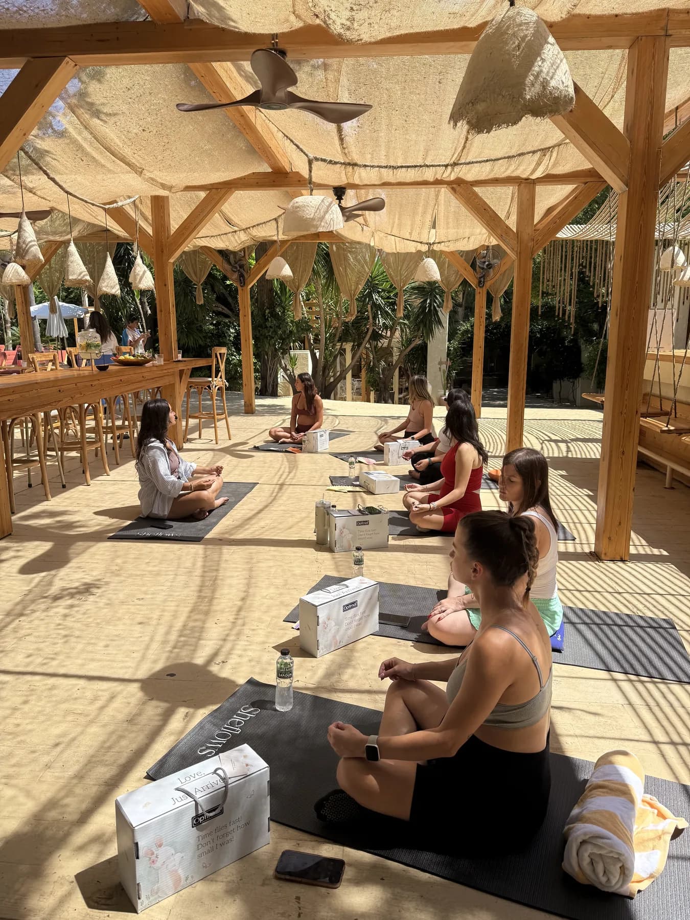 Participants gathered in a circle at the prenatal wellness event