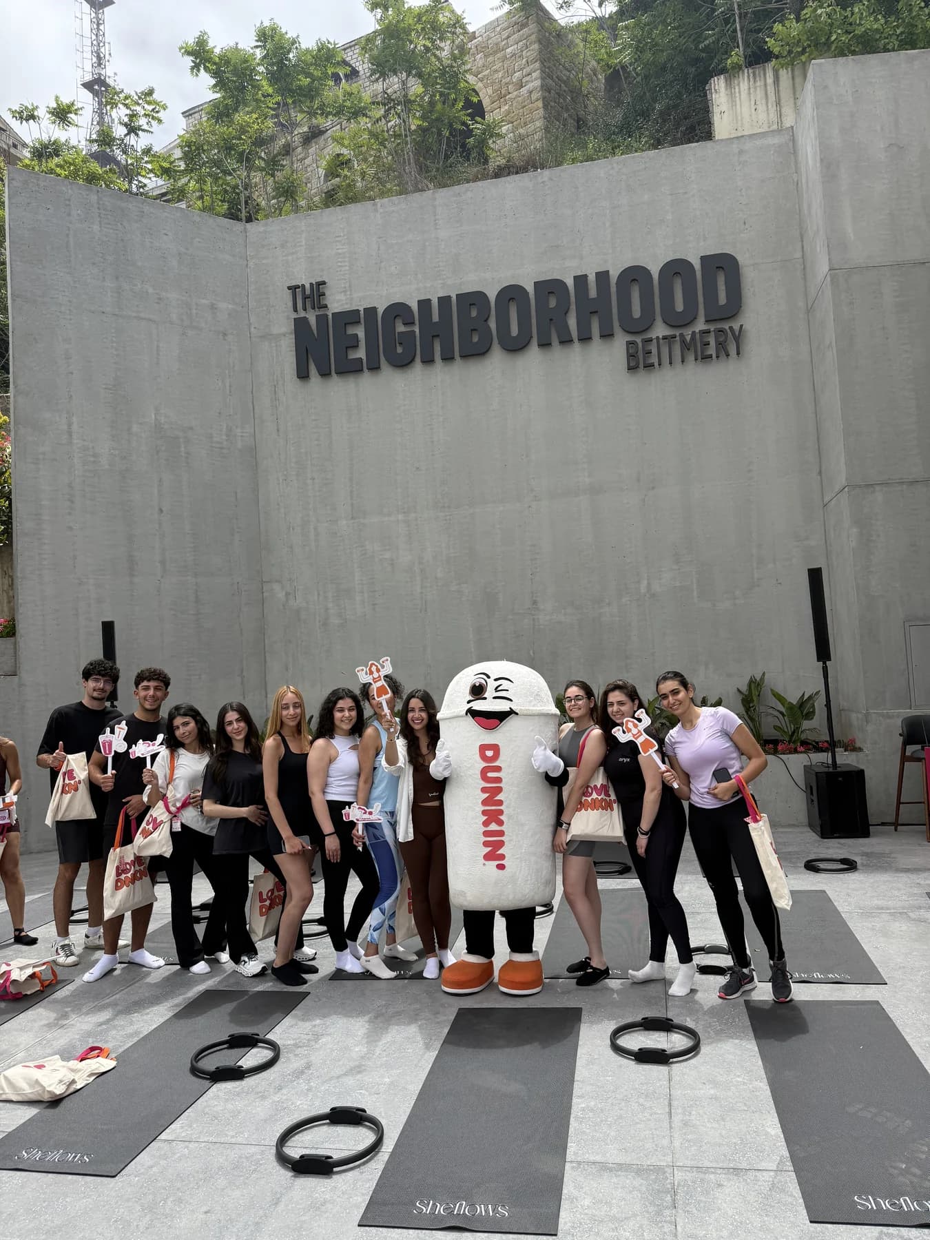 Participants at a SheFlows corporate wellness activation with Dunkin.
